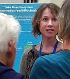 image - Melissa Hallas listening during public meeting